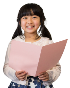 a young girl is holding an open folio and smiling